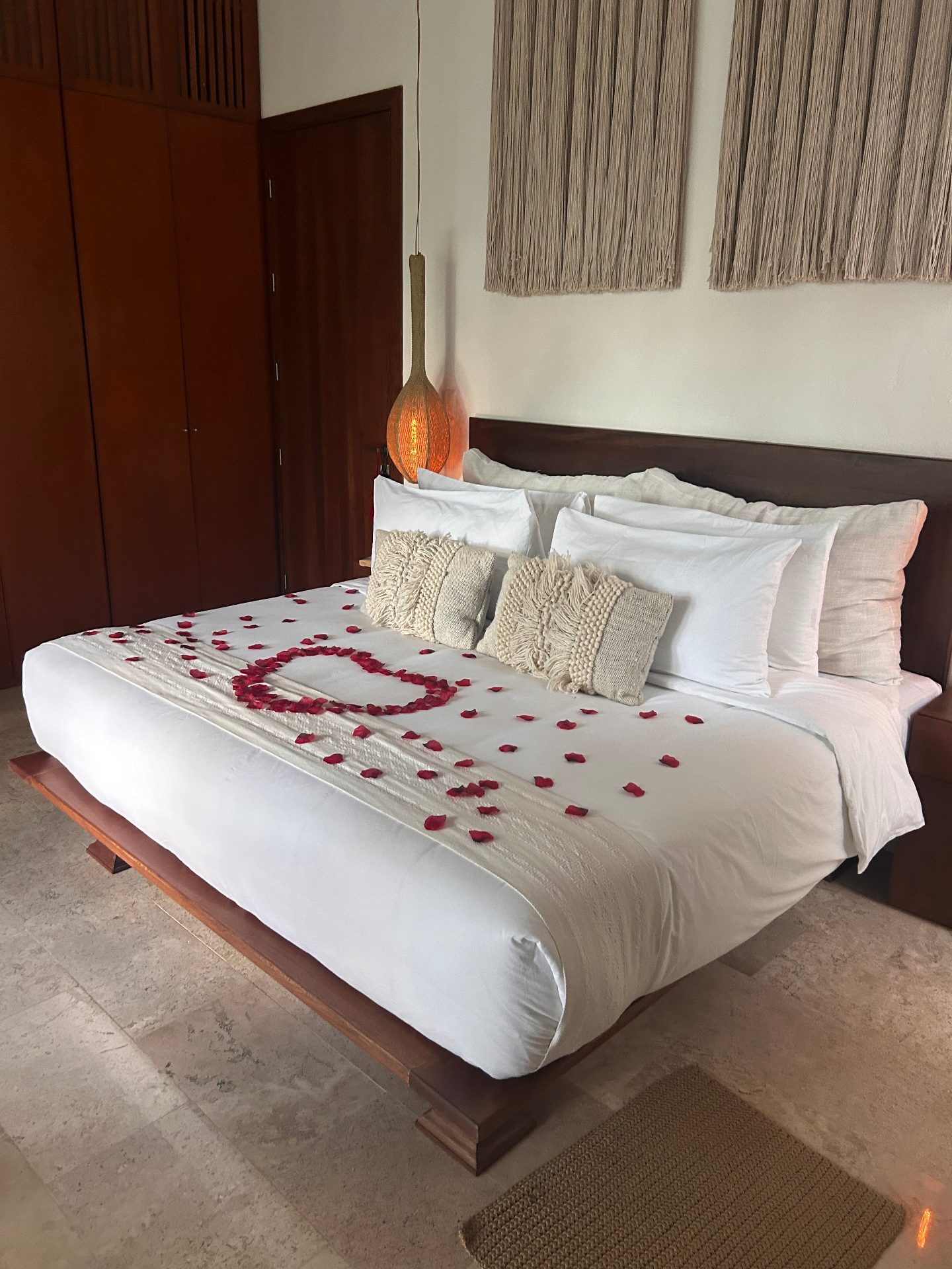 Friends room with queen bed and hanging hammock