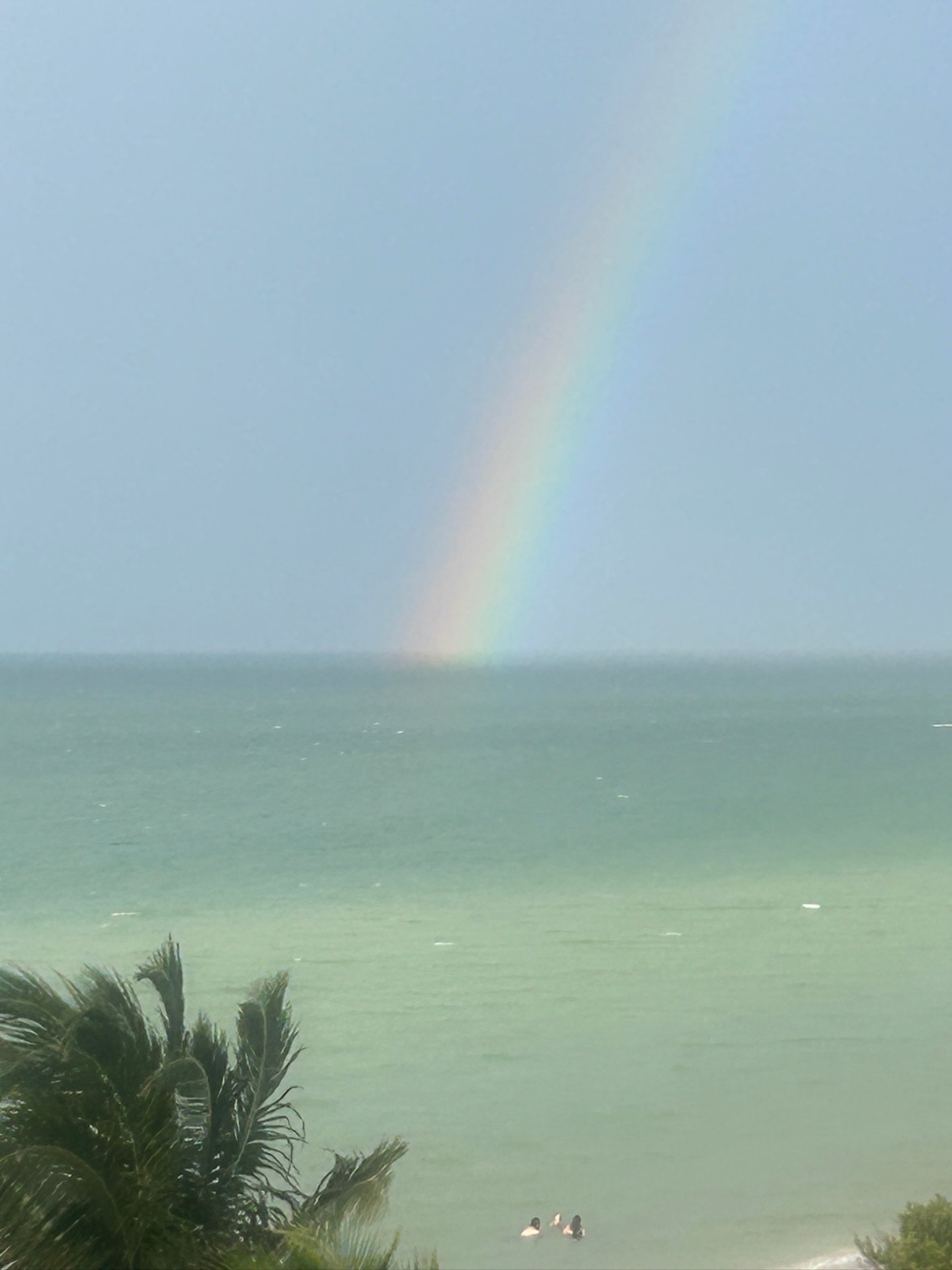 Rainbow over the sea seen from the penthouse
