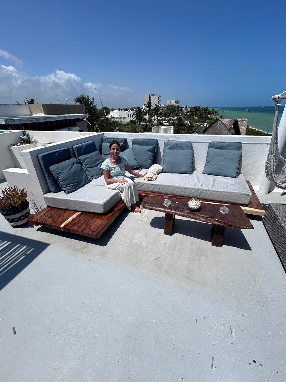 Rooftop sectional sofa with panoramic coast view